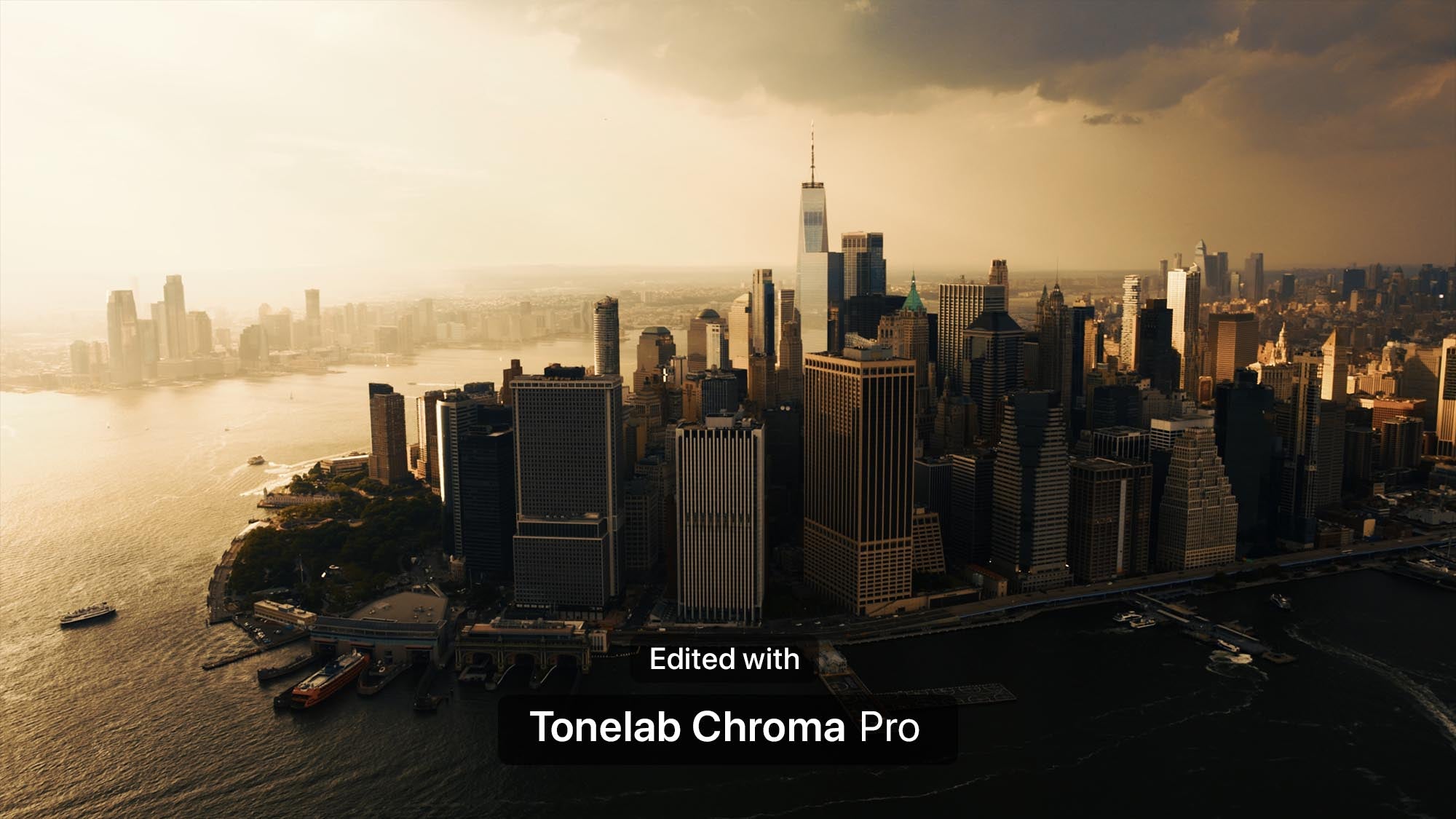 Aerial view of a city skyline at golden hour with water in the foreground and text overlay reading 'Edited with Tonelab Chroma Pro'.
